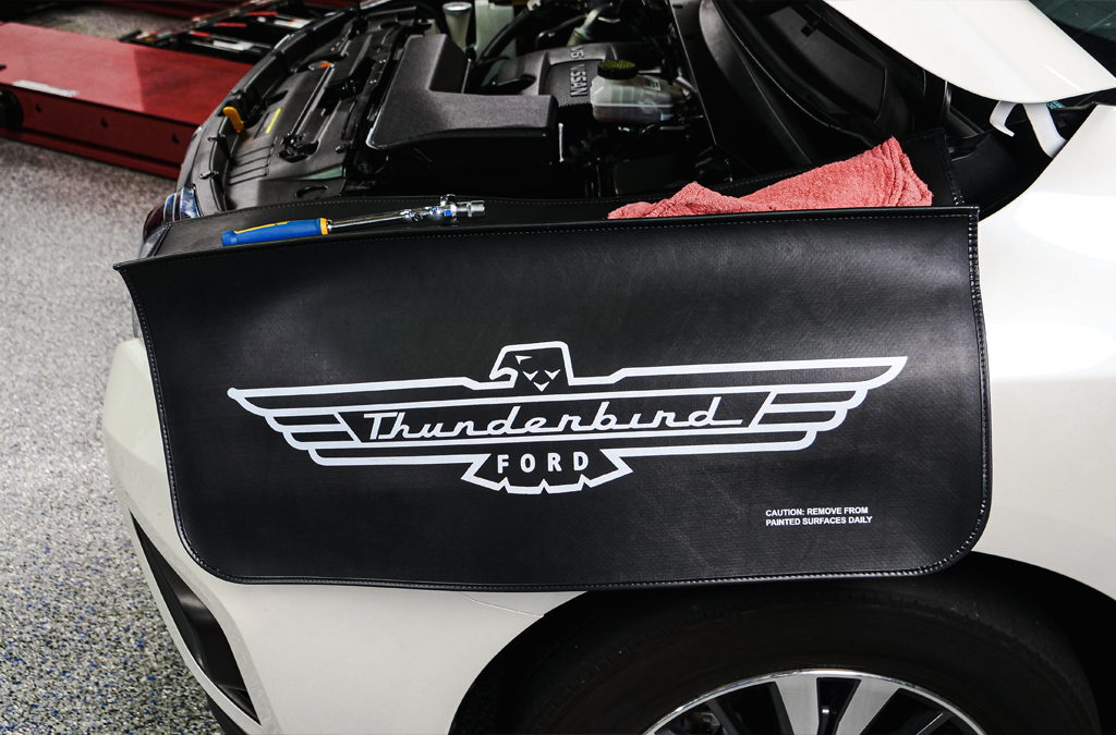 Heavyweight fender cover with the Thunderbird Ford logo printed on it